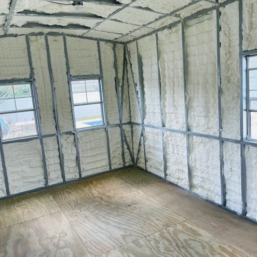 Closed-cell spray foam insulation applied to wall cavities in a residential project in Eaton Rapids